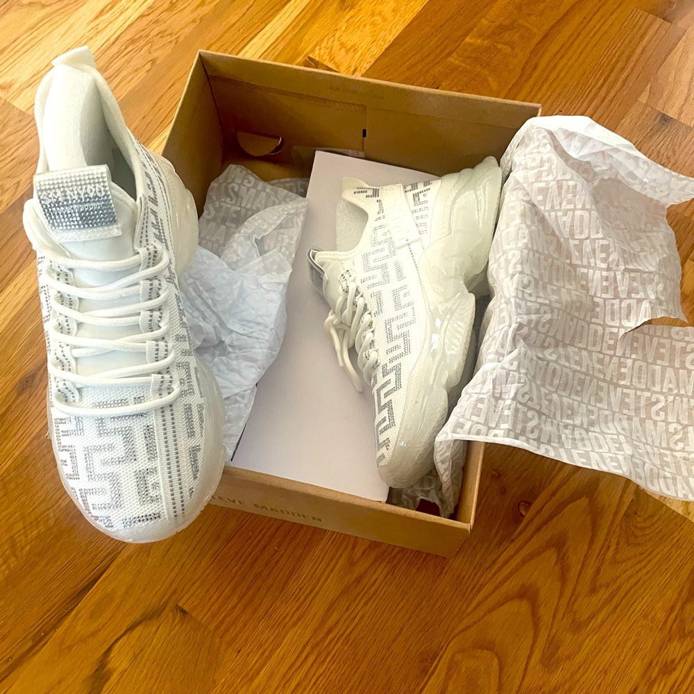 Brand new Steven Madden silver/white sneaker. Size 8